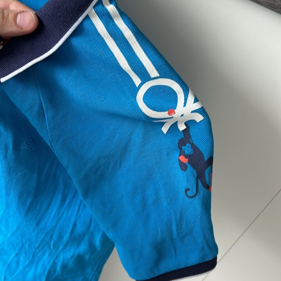 United Colors of Benetton Light Blue Monkey Polo Shirt - Medium (Fits Small) - Picture 1 of 7